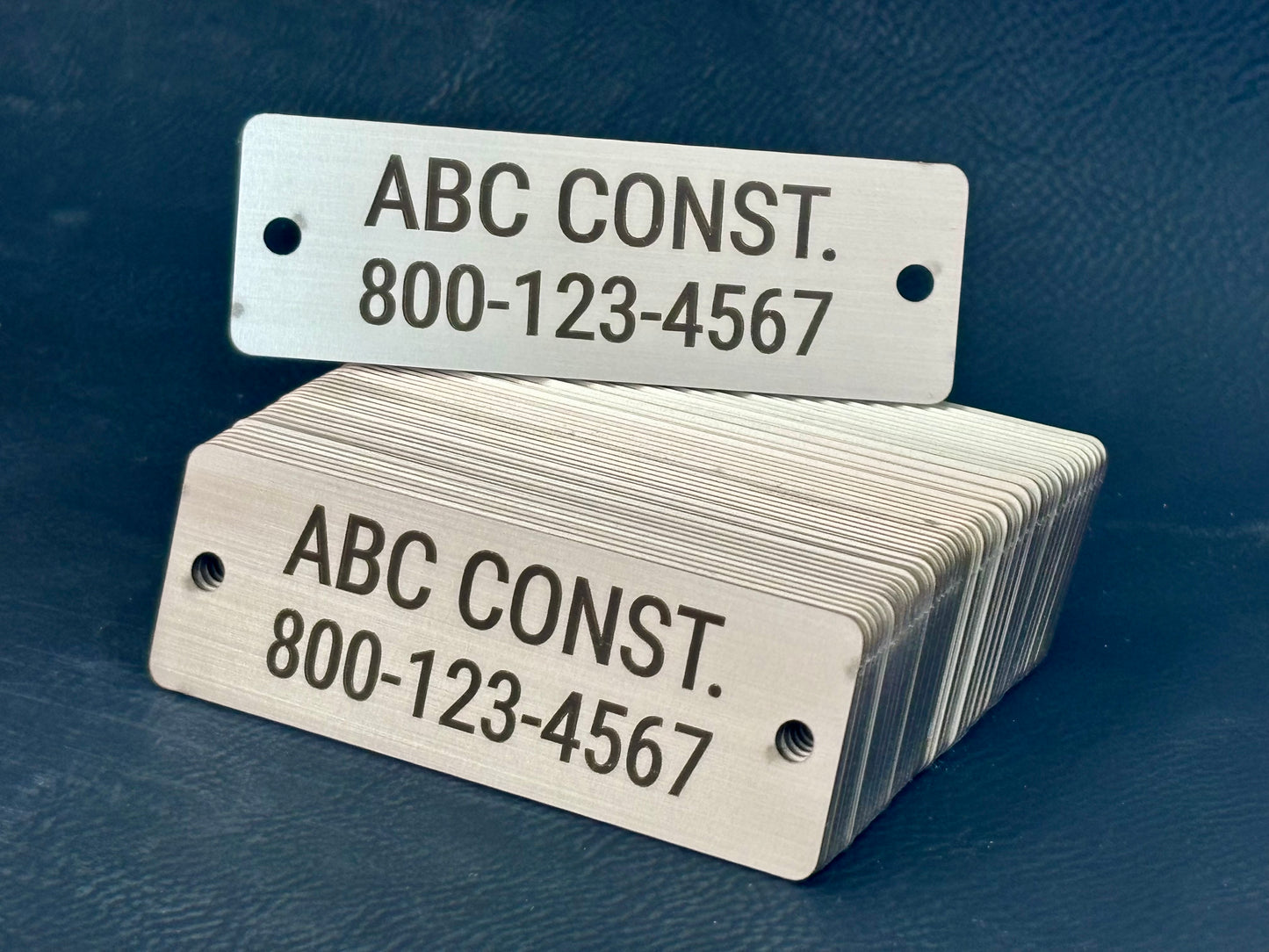 1x3 matching bulk tags with business name and phone number