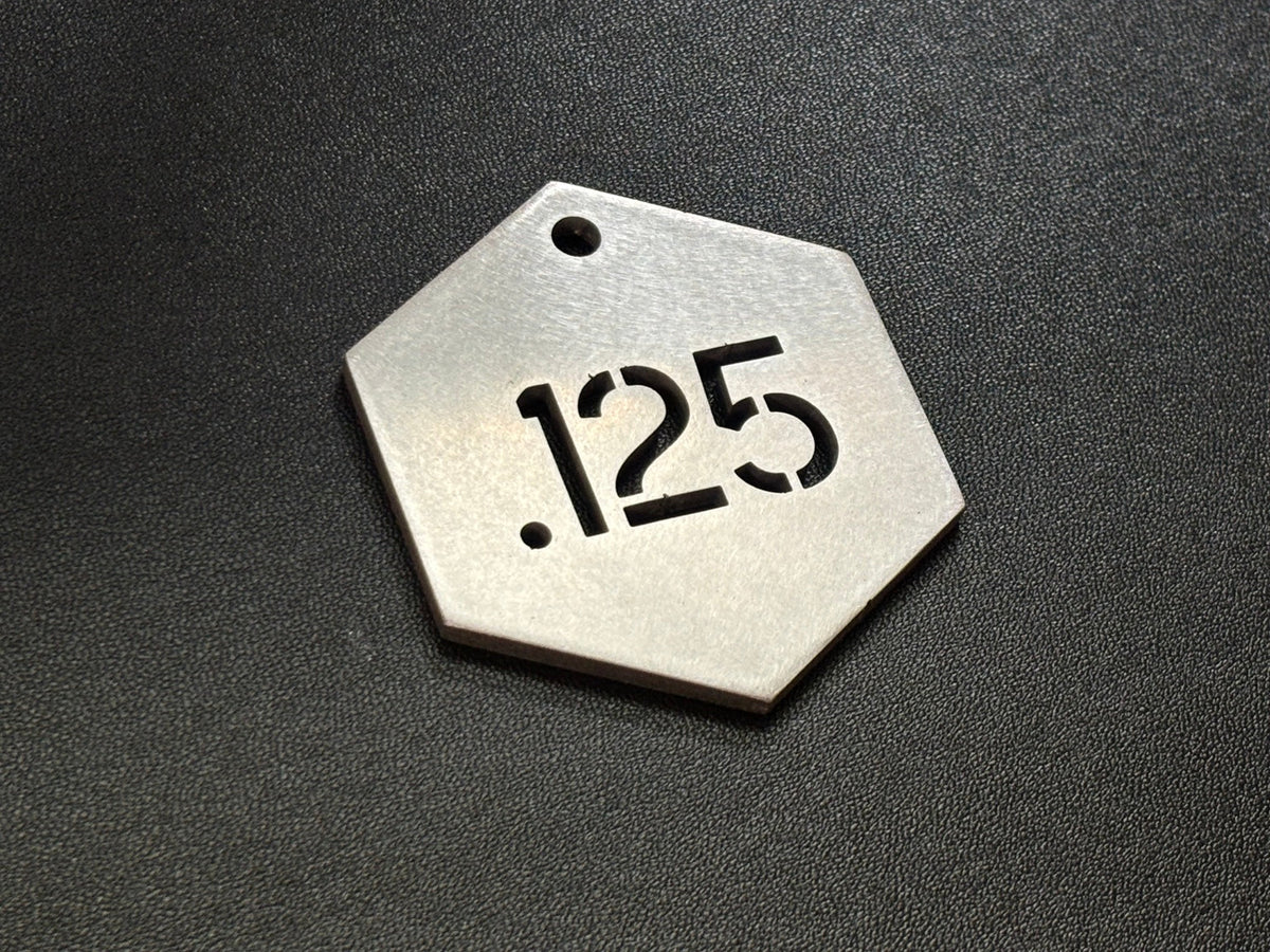 Hexagon stainless steel sequential cut-through valve tag marked 125