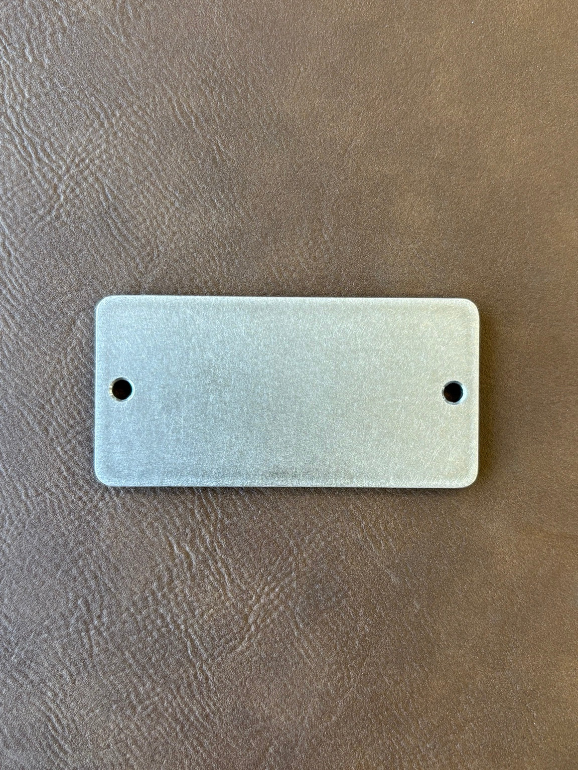 1.5" x 3" premium stainless nameplate – front view of blank plate
